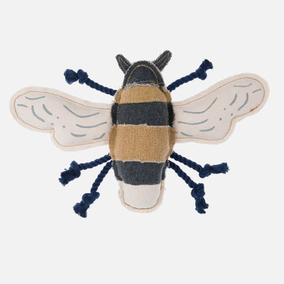 A bee-shaped dog toy with a navy body, beige and black stripes, and a textured surface, made from canvas fabric with rope legs.