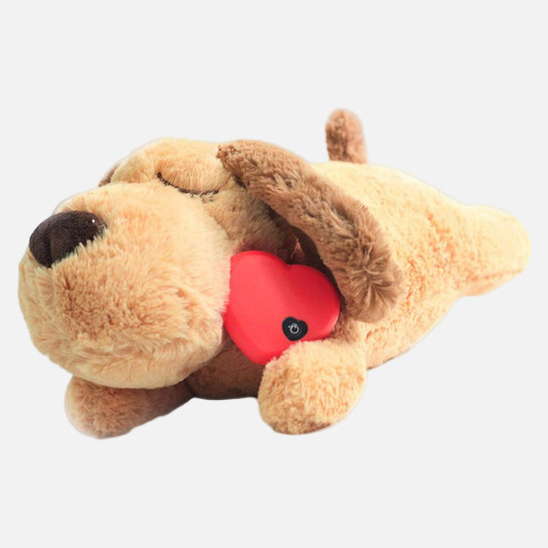 Plush dog toy with a red heart on a white background