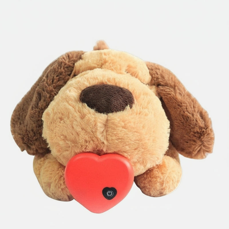 Plush dog toy with a red heart and black button on a white background