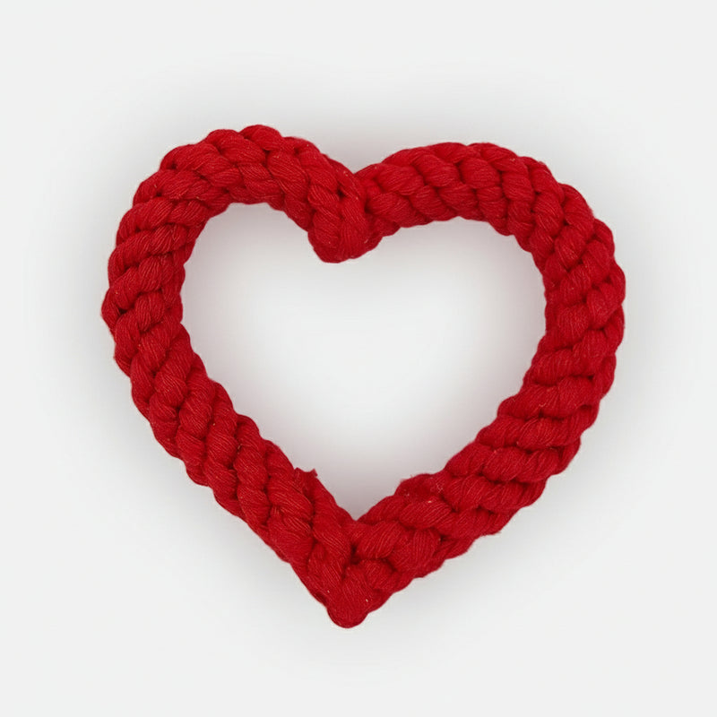 Heart-shaped cotton rope dog chew toy in red, designed for durability and gentle dental cleaning.
