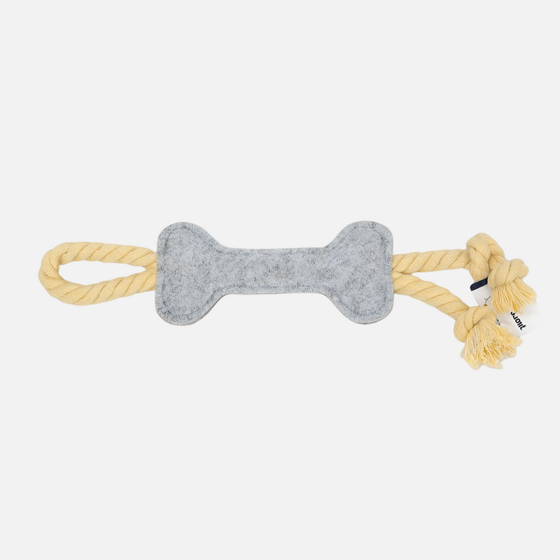 Dog toy with gray bone shape and yellow rope on a white background