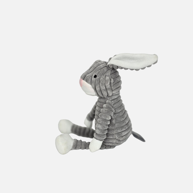 Gray and white striped cat-shaped plush toy on a light gray background
