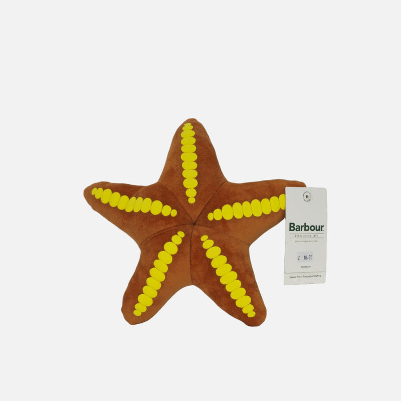 Star-shaped toy with yellow accents and a Barbour tag on a white background