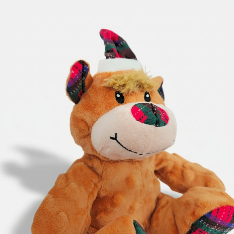 Soft Christmas teddy bear dog toy with tartan details and a built-in squeaker.